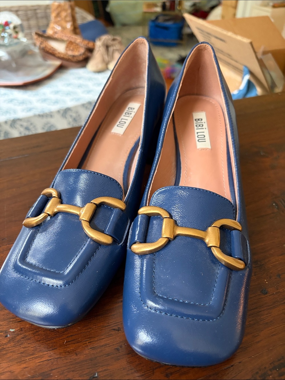 BiBi Lou Navy Leather Loafers with Gold Buckle Accent